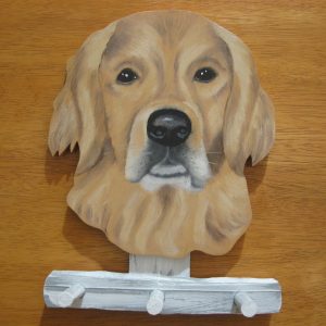 Kultainennoutaja naulakko